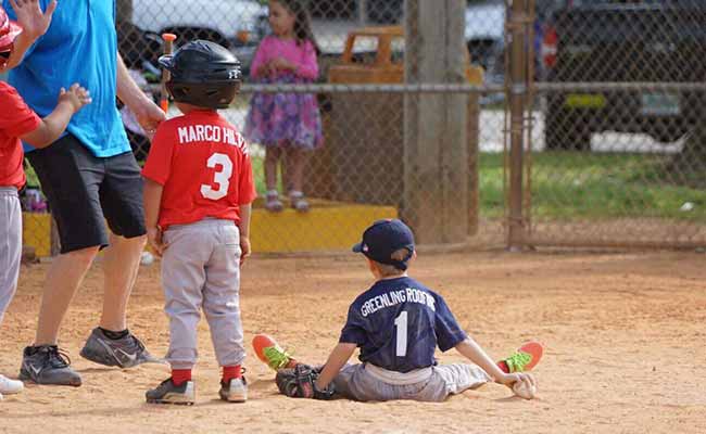 Corban on Greenling's sponsored Little League Team | Naples Roofing Contractors