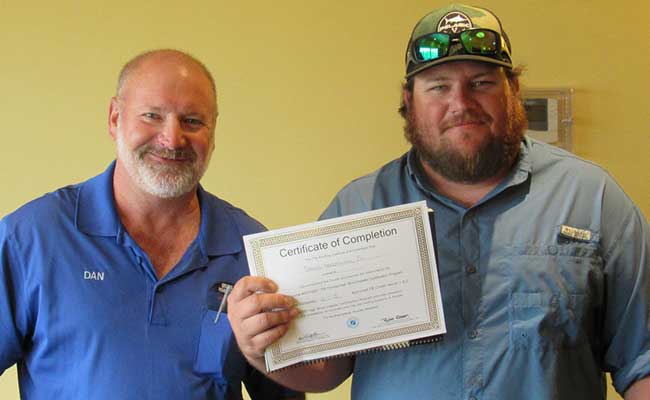 Dan Greenling Sr. and Dan Greenling Jr. after completing Tile Roofing Certification | Greenling Roofing Naples Roofing Contractors