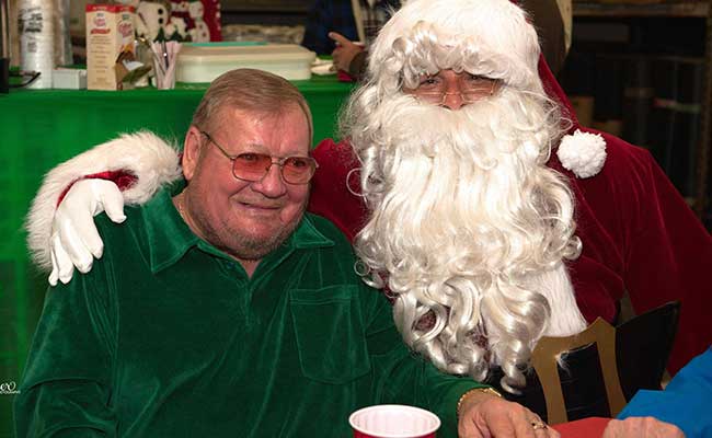 George Greeenling and Santa at Greenling Roofing's annual company Christmas party