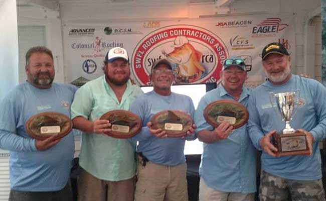 Greenling Roofing Team with their fishing trophies | Naples Roofing Contractors